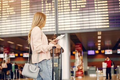 Beautiful girl standing in a airport Beautiful girl standing in a airport